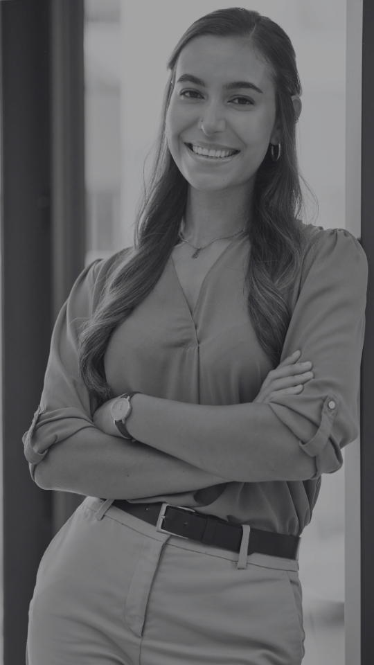 Young corporate woman arms folded and smiling Young corporate woman arms folded and smiling