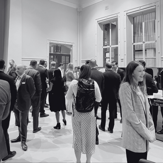 Networking at Reo Group's event